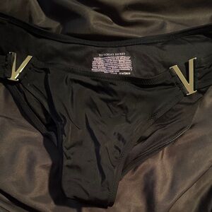 Victoria's Secret Black swim bottomswith gold Accents